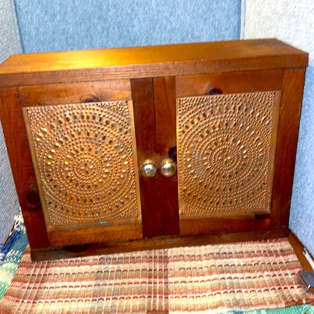 Wooden cabinet with punched copper handmade